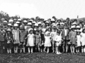 96  Children with mugs. Possibly Coronation 1937 or Jubilee 1935